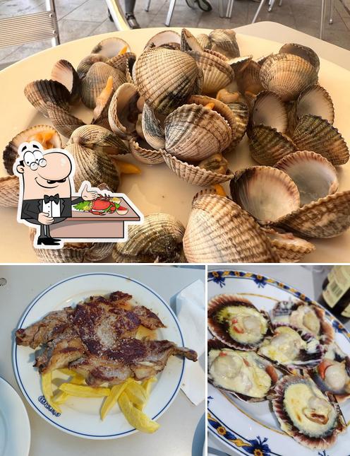 Закажите блюда с морепродуктами в "Taberna Da Calzada"