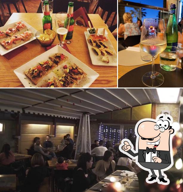 La foto della interni e tavolo da pranzo di VINARTE Pizza & Fuoco • Agropoli