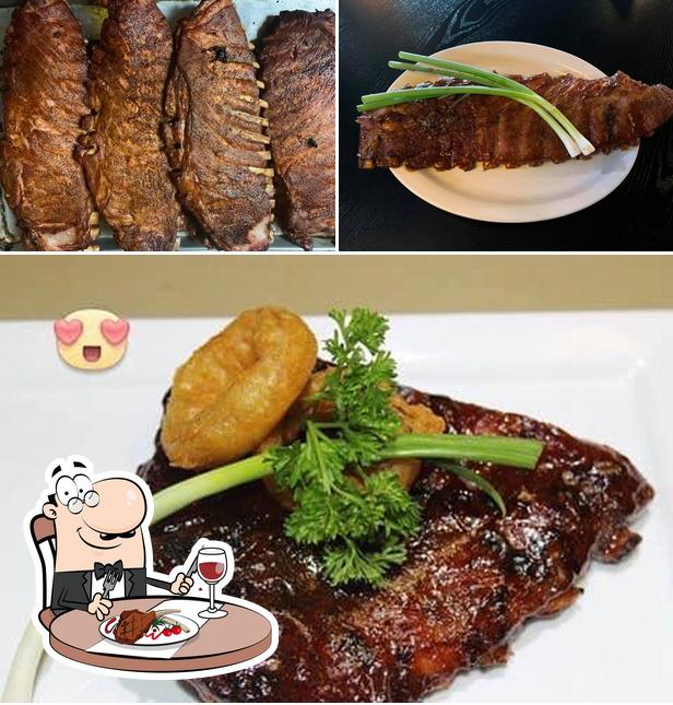 Get meat dishes at Golden Feather BBQ