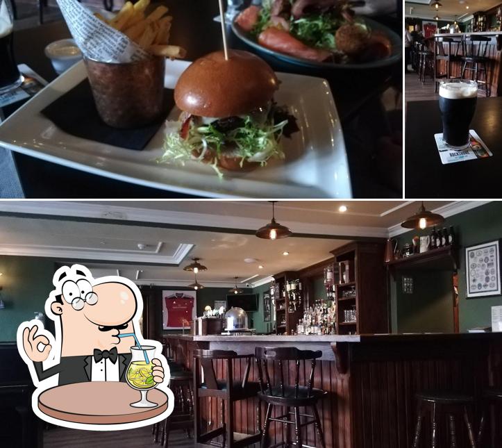 The image of drink and burger at The Fountain Bar