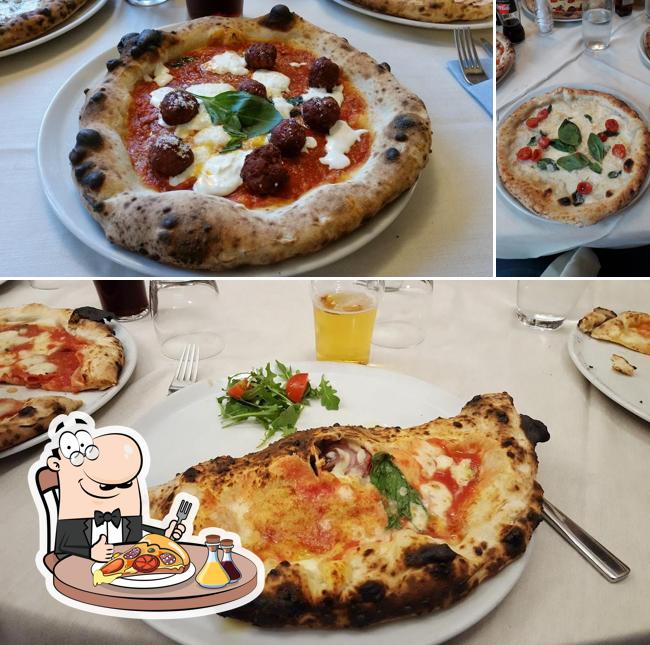 Get pizza at L'Angolo Partenopeo