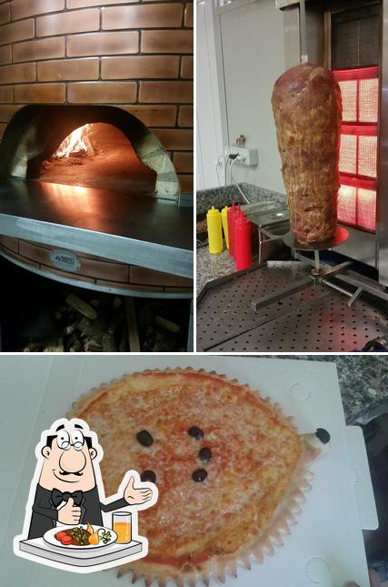 Tra le varie cose da Pizzeria La Favola si possono trovare la cibo e interni