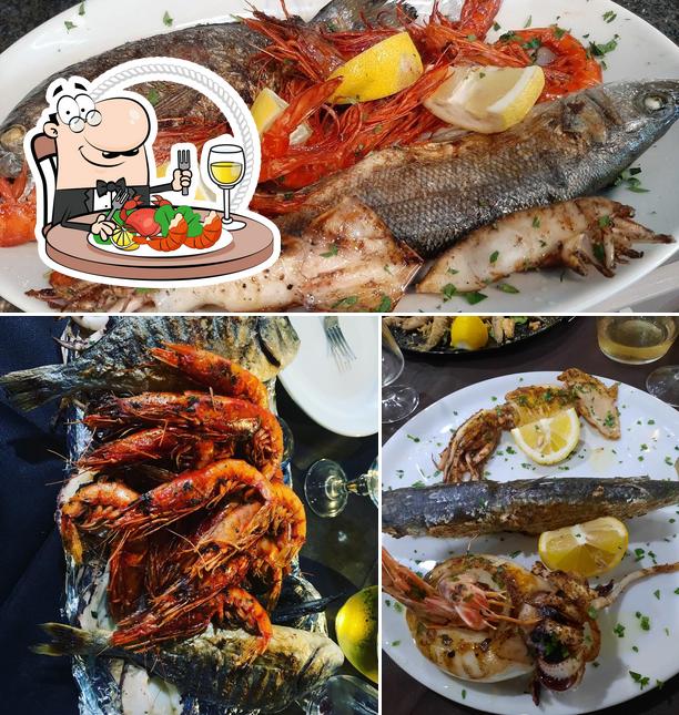 Degusta i sapori della cucina di mare a Ristorante Sotto La Torre