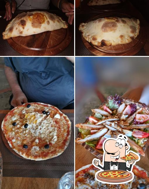 Pick pizza at Le Relais Pizzeria & Mediterranean Restaurant