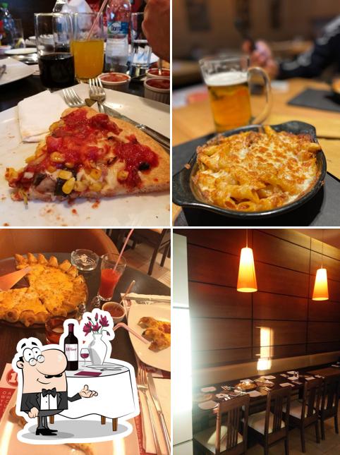L’image de la table à manger et boire concernant Pizza Hut
