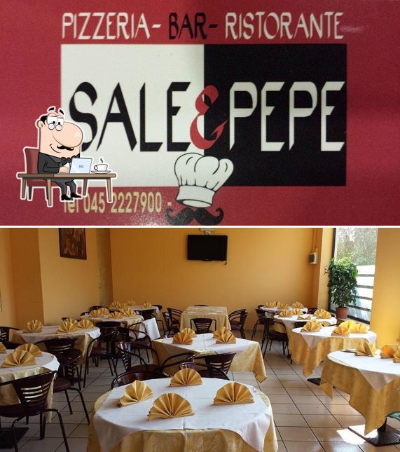 Take a seat at one of the tables at Pizzeria Sale e Pepe