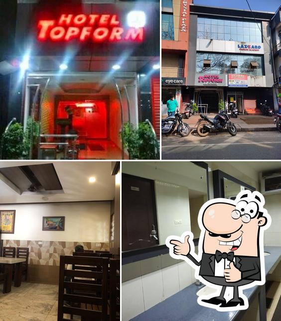 Look at the pic of Hotel Topform Payyanur