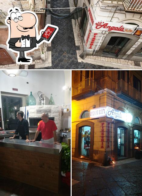 Guarda la foto che mostra la esterno e interni di Pizzeria all'Angolo Avella