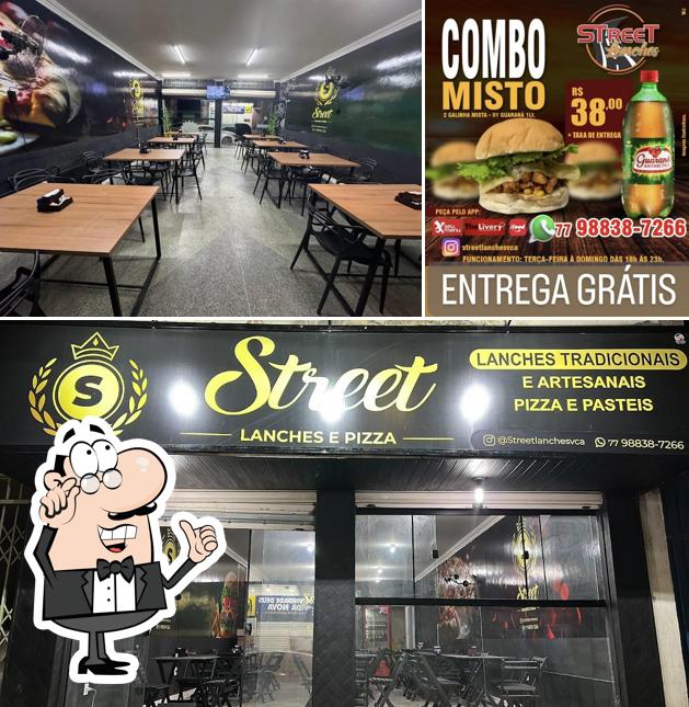 The image of interior and food at Street lanches e pizzas