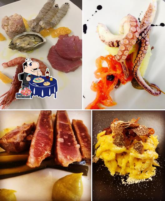 Get different seafood dishes served at Locanda Quinto Canto Gradara