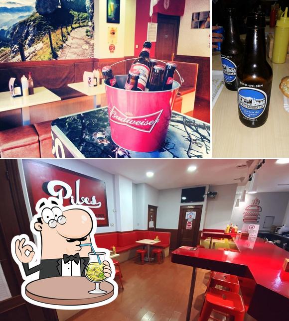 The picture of Hamburguesería Pibes’s drink and interior