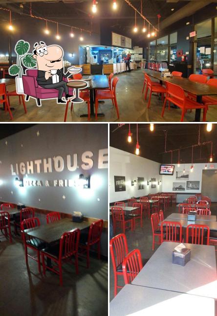 Take a seat at one of the tables at Lighthouse Pizza