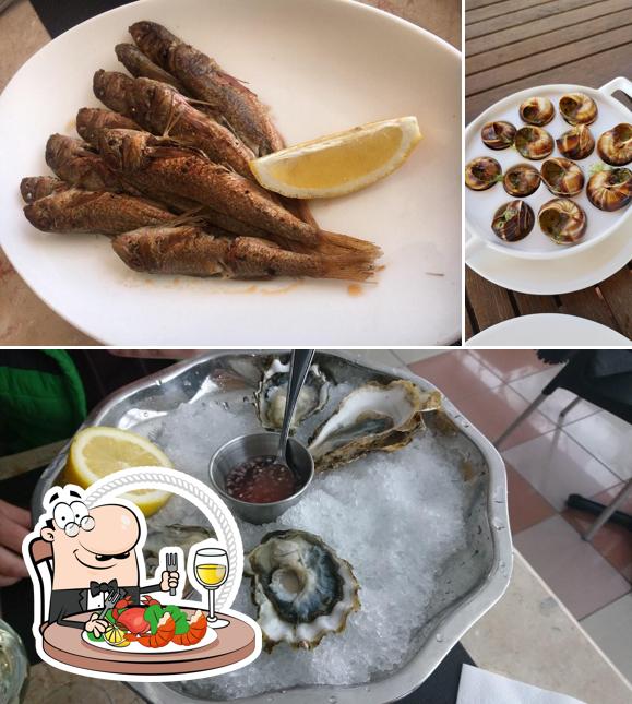 Try out seafood at Устричный бар «Ама»