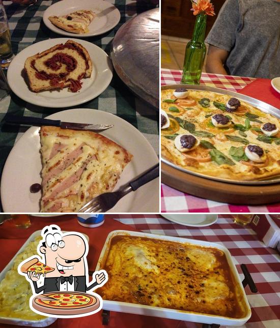 Escolha pizza no Pizzaria Mingui & Aliche