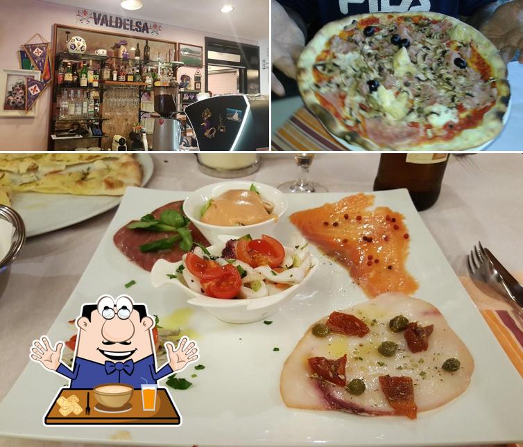 Pizzeria Ristorante Maroni Di Maroni Daniela si caratterizza per la cibo e bancone da bar