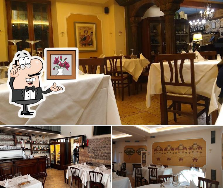 Dai un'occhiata agli interni di Osteria da Ugo