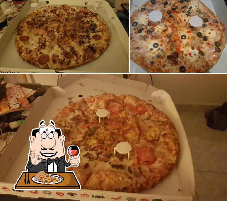 Отведайте пиццу в "Pizzería Carlos"