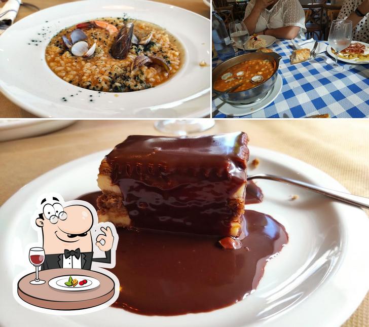 Observa las fotografías que hay de comida y interior en Rompeolas Somo (Cantabria)