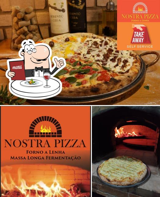 A imagem a Pizzaria Nostra Pizza’s comida e interior