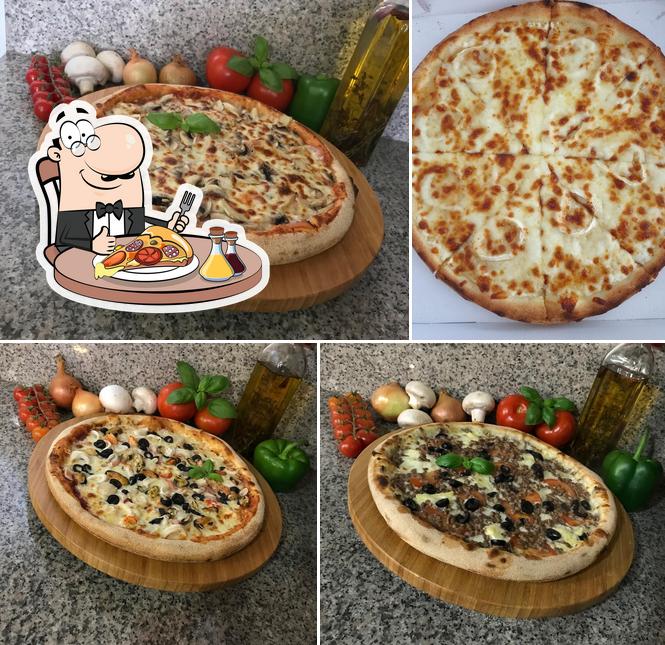 Prenez des pizzas à La Casa de Pizza