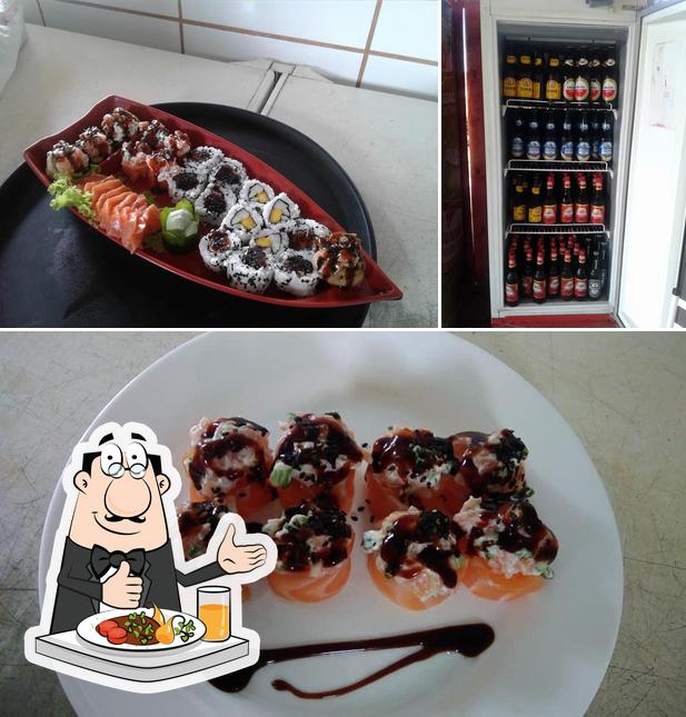 Dê uma olhada a imagem apresentando comida e cerveja no Kenji Sushibar