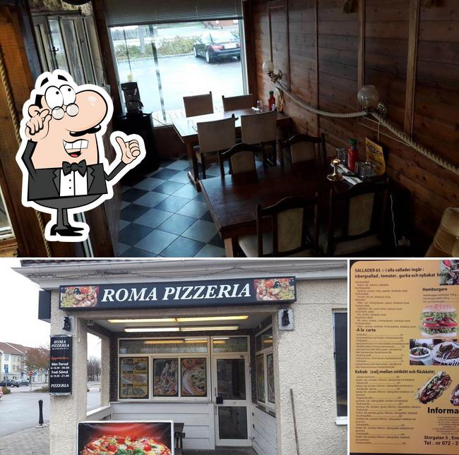 This is the image showing interior and burger at ROMA Pizzeria