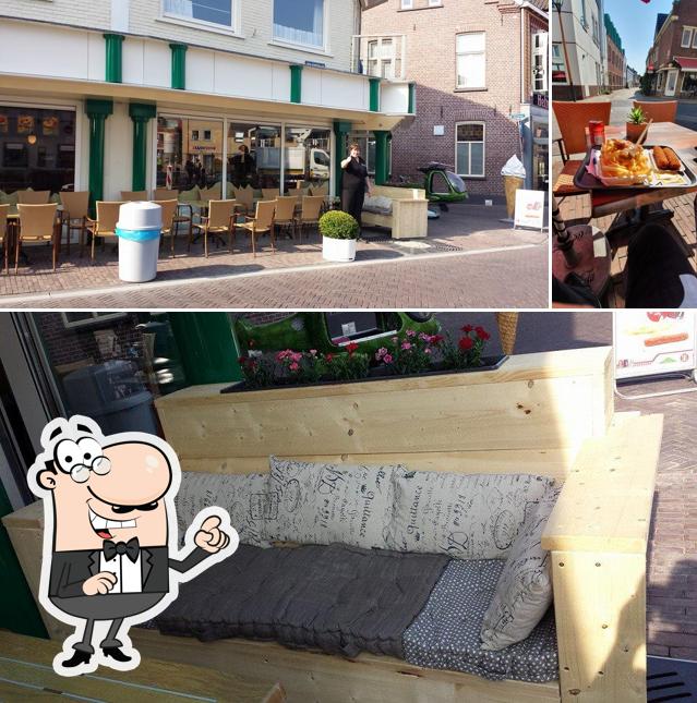 Dies ist das Foto das innere und esstisch bei Snackrestaurant Het Stadsplein darstellt