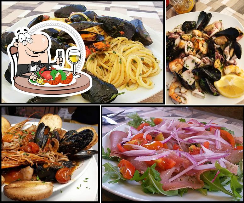 Try out seafood at La Mela - Pizzeria Ristorante