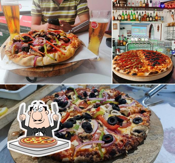 Попробуйте пиццу в "Snack Bar Pizzaria Paraíso"