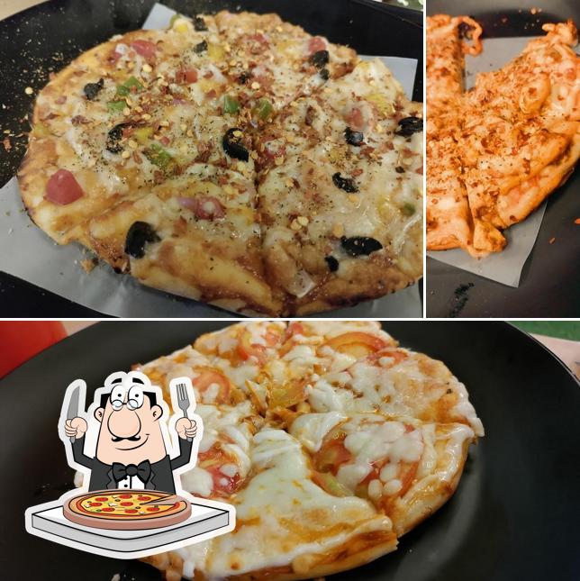 Get pizza at Cafe Arosha