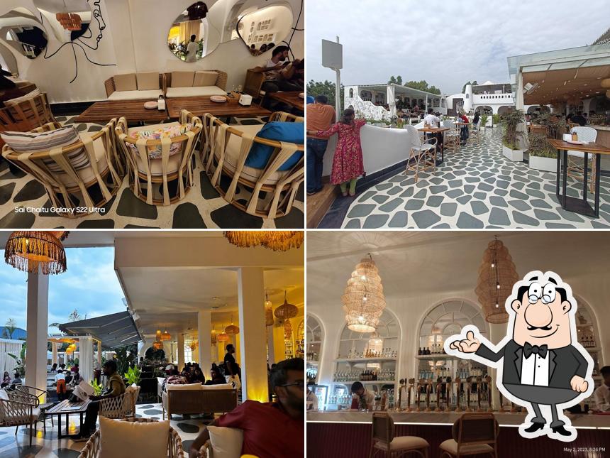 Take a seat at one of the tables at Oia Bangalore