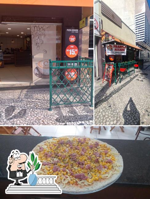 A imagem da exterior e mesa de jantar a Garota Carioca Pizza