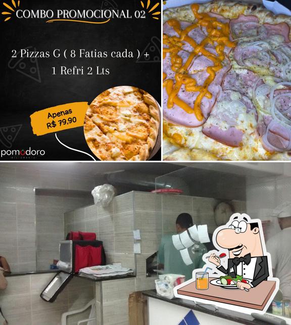 Entre diferentes coisas, comida e interior podem ser encontrados a Pomodoro Pizzaria