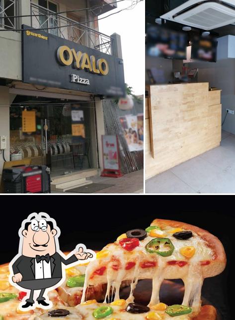 The photo of interior and sushi at Oyalo pizza