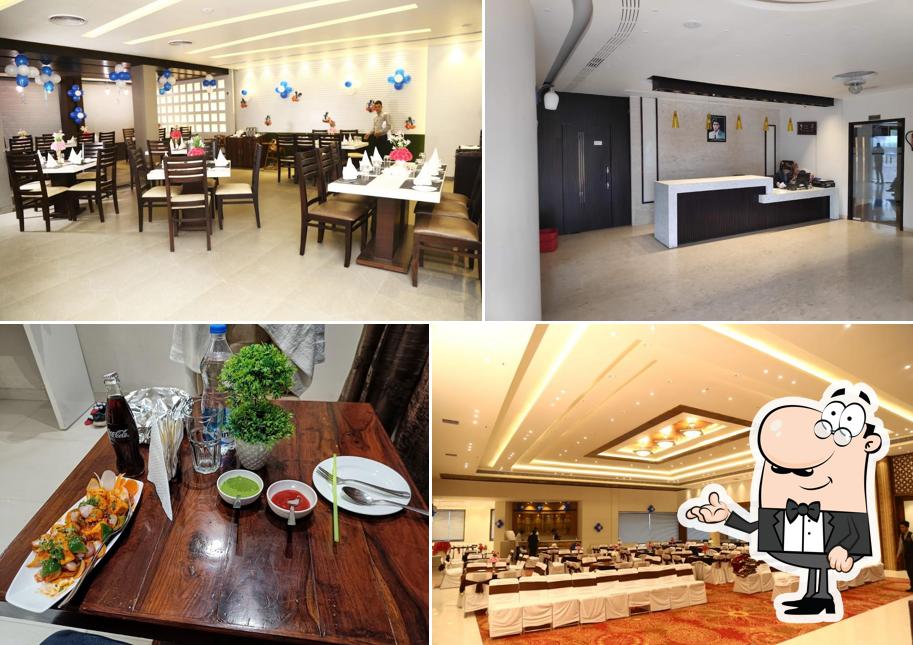 Take a seat at one of the tables at Yadvindra Dream Hotel