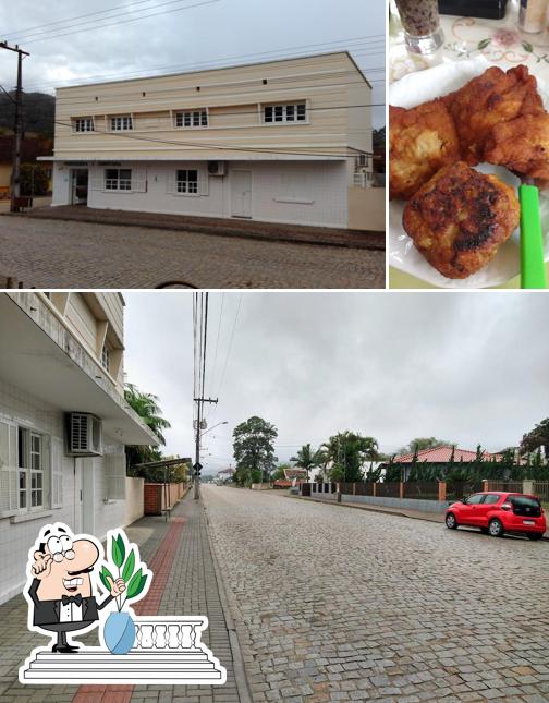 The photo of exterior and food at Padaria da Vitória