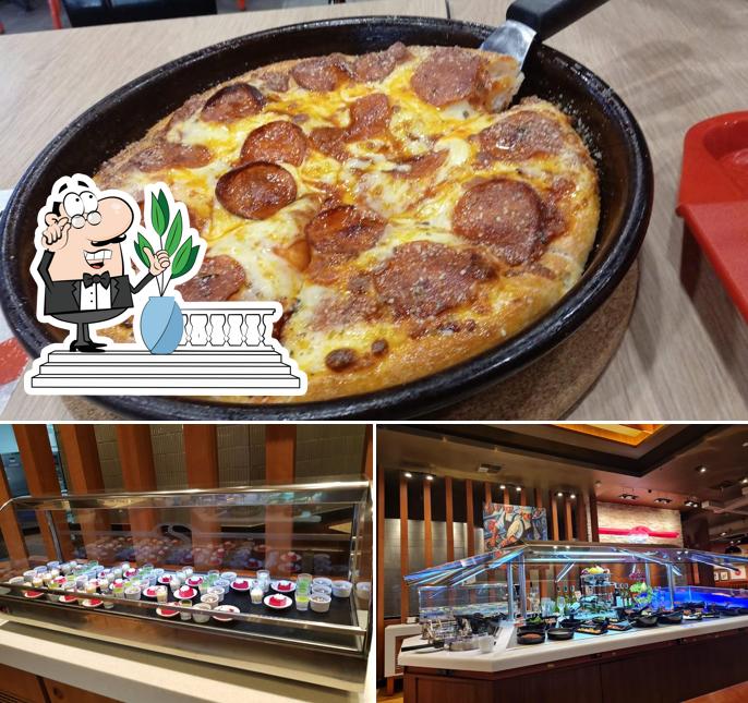 The image of exterior and pizza at Sizzler