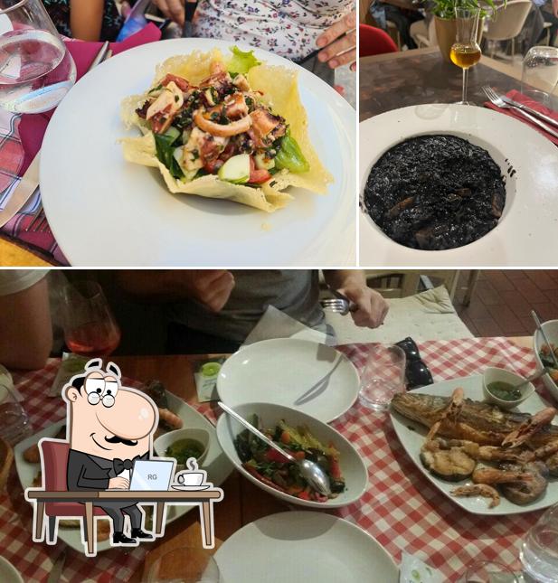 Siediti a un tavolo di Konoba Marjan