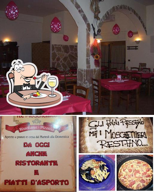 La foto della cibo e interni di Pizzeria I Tre Moschettieri