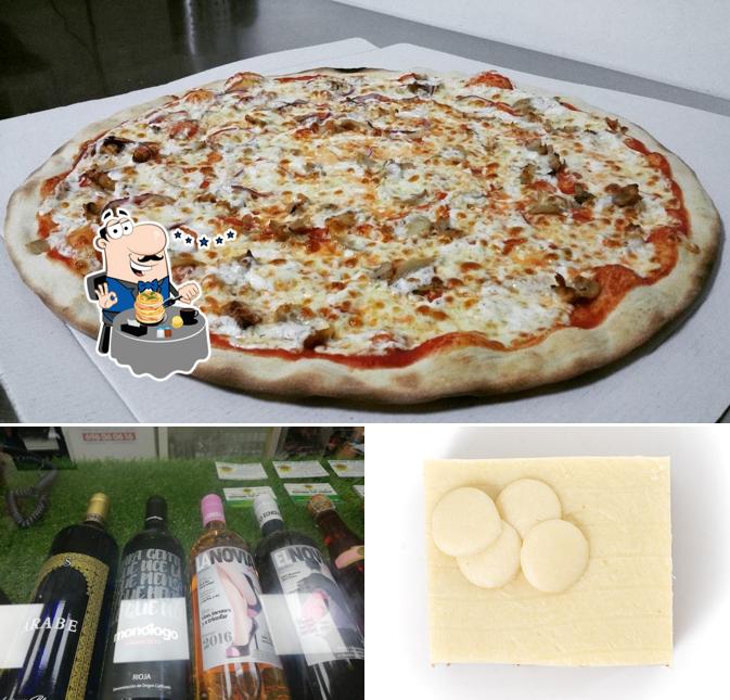 Это снимок, где изображены еда и пиво в Express Vip Pizzas Camas