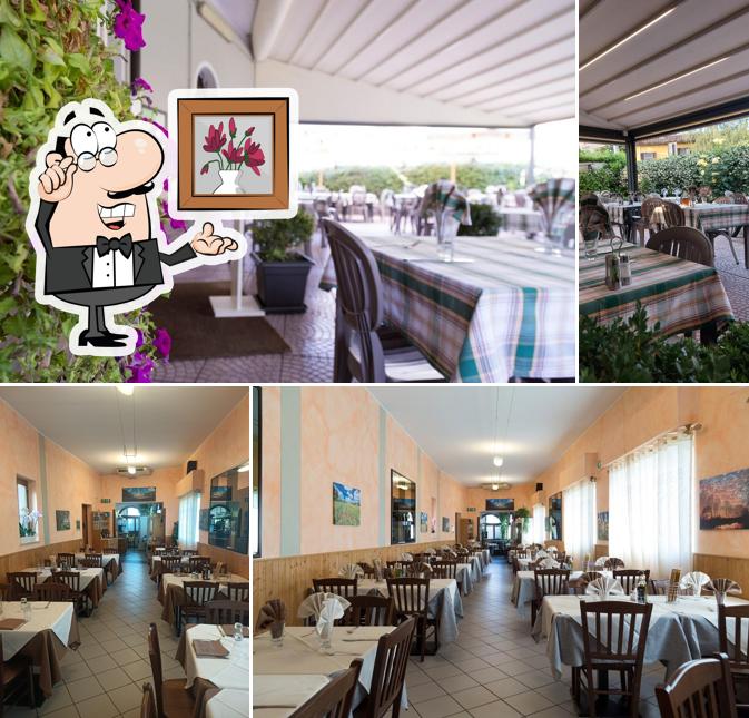 Dai un'occhiata agli interni di Ristorante Pizzeria Sapore di Mare con Tavoli Giardino