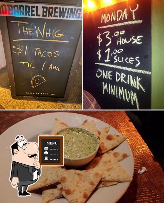 The photo of blackboard and food at The Whig