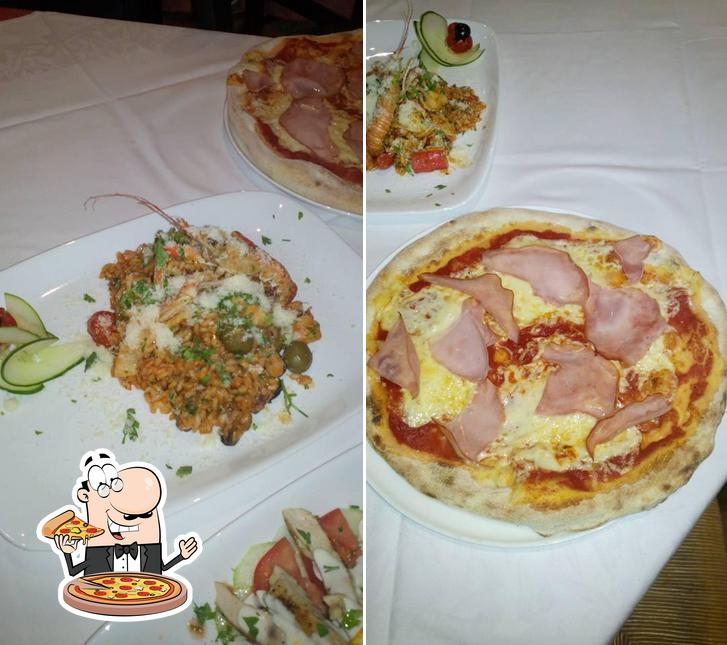 Prova una pizza a Restoran Pizzeria I Apartmani Midnight