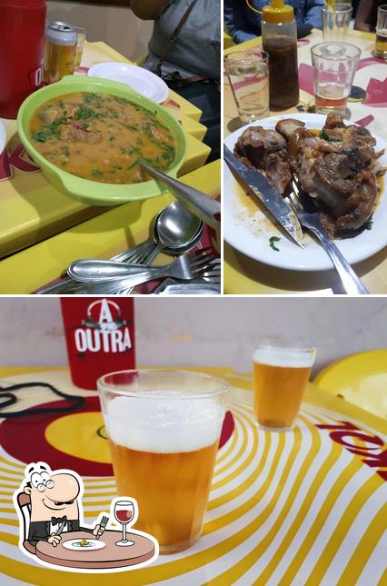 Esta é a imagem apresentando comida e cerveja no Bar Do Regis Cidade Nova