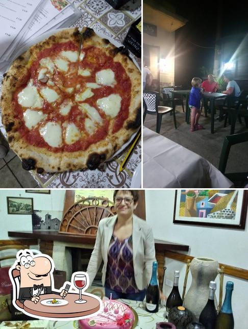 Фото, на котором видны еда и внутреннее оформление в Santa Croce Pizzeria Osteria Casteltermini