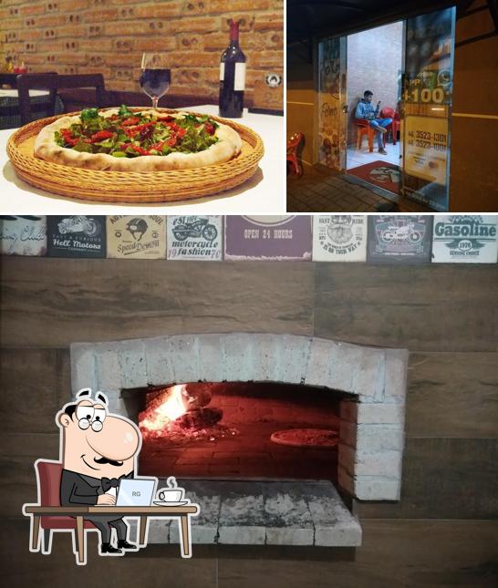 Entre diferentes coisas, interior e vinho podem ser encontrados a Pizzaria Roma