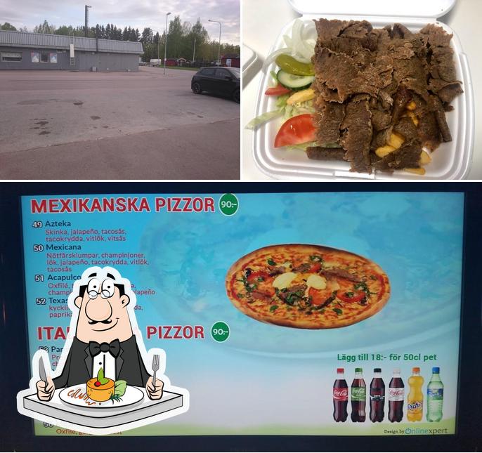 Check out the image showing food and exterior at Irsta Pizzeria