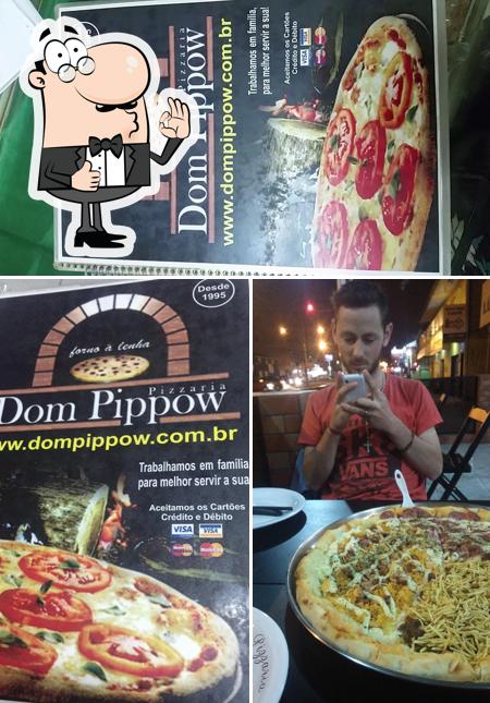 Look at the photo of Pizzaria Dom Pippow