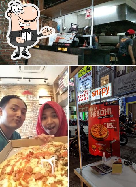 See this photo of Pizza Hut Delivery - PHD Indonesia