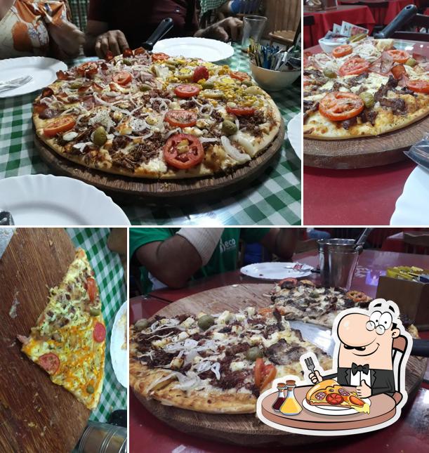 Consiga pizza no Heleno Churrascaria e Pizzaria